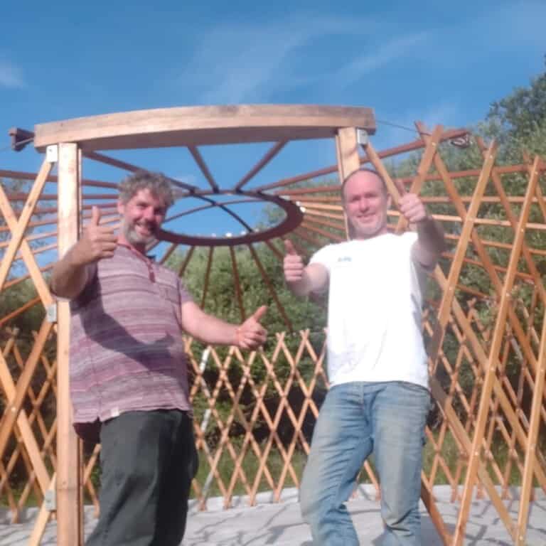 Friends of Glenan Wood - our ranger Rhyddian and helper erecting a yurt